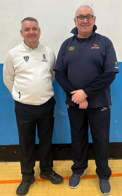 Umpires Neill Crawshaw and Sean Evans